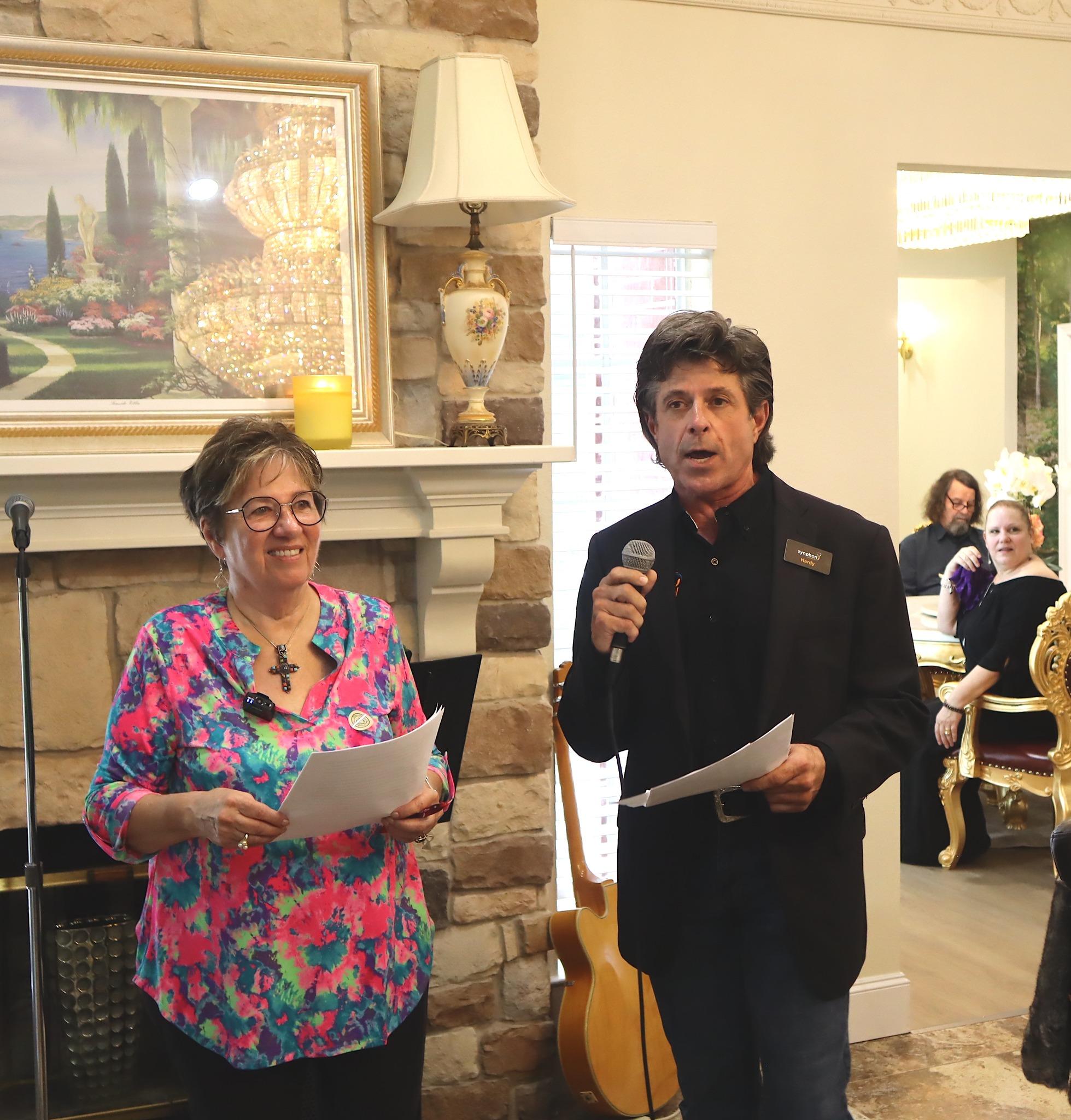 Image of Charlie Montgomery (Director of Marketing) and Mr. Hardy at the Chateaux Serenity Open House